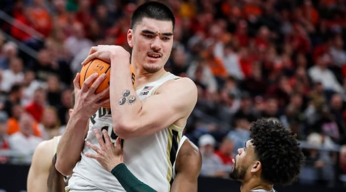 Purdue center Zach Edey (15) grabs a rebound against Michigan State forward Malik Hall (25) during the second half of quarterfinal of Big Ten tournament at Target Center in Minneapolis, Minn. on Friday, March 15, 2024.